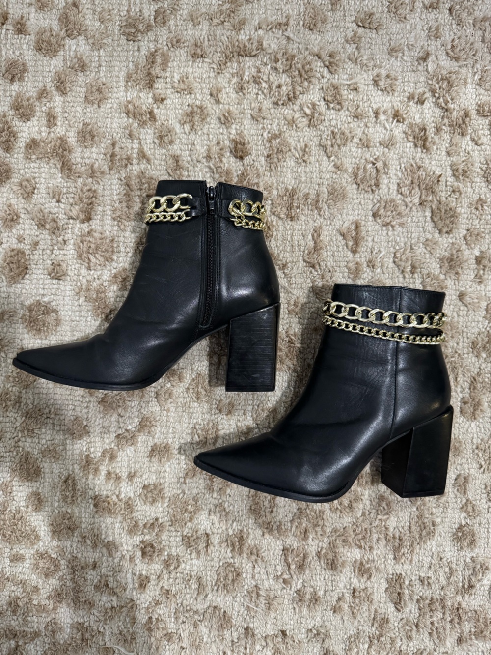 Steve Madden Black Leather Ankle Boots with Gold Chain Accent